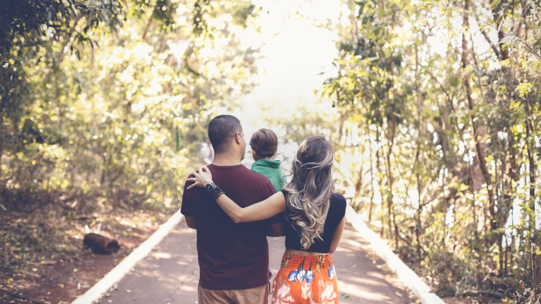 Young family on walking trail.